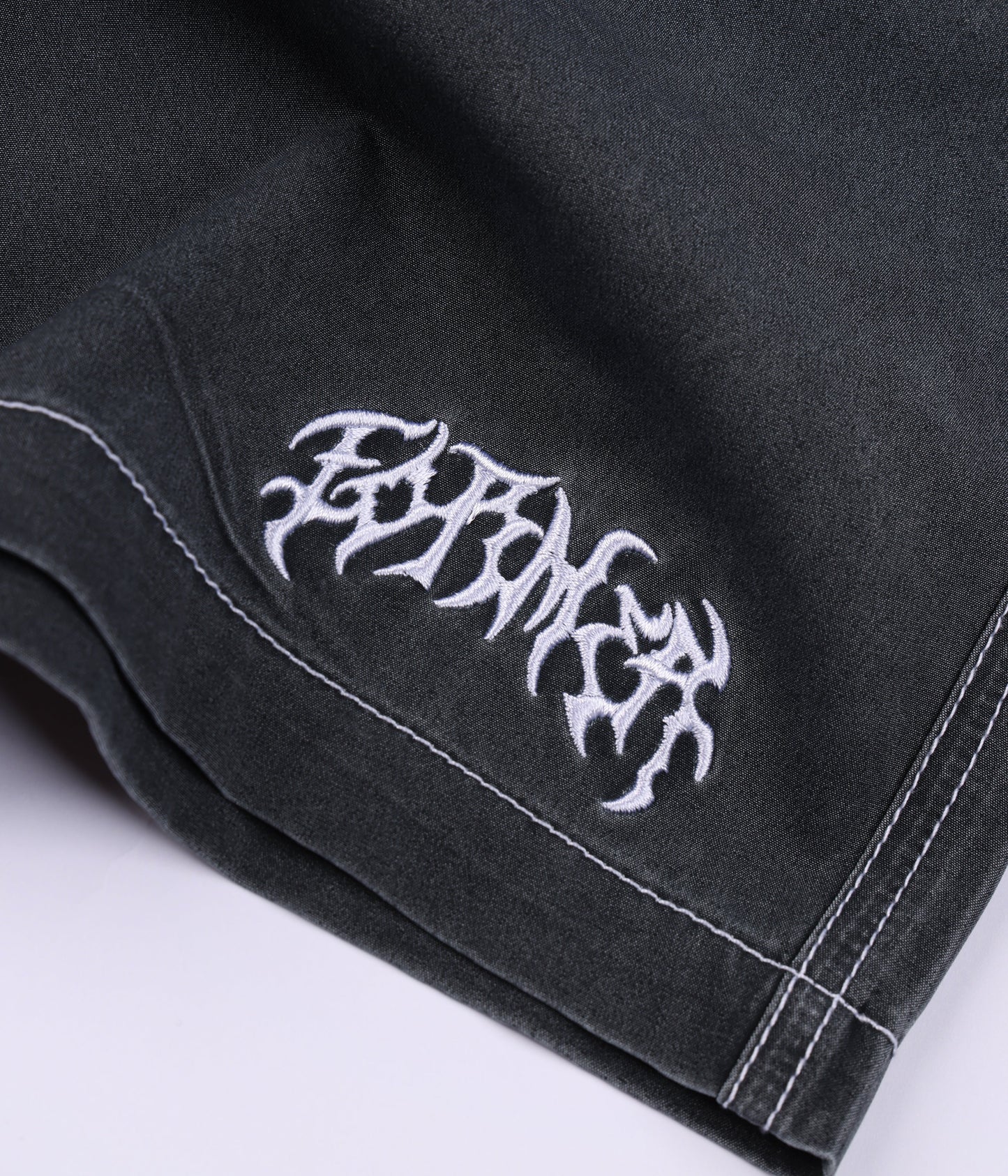 SWANS PUNCTURE 18" SWIM SHORT // BLACK